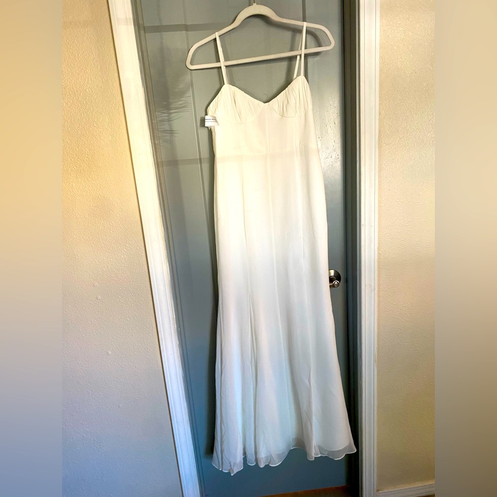 Fame and partners wedding dress